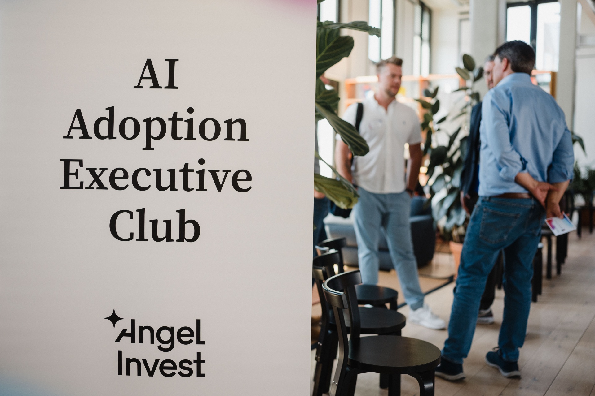 AI Adoption Executive Club signage at a past event
